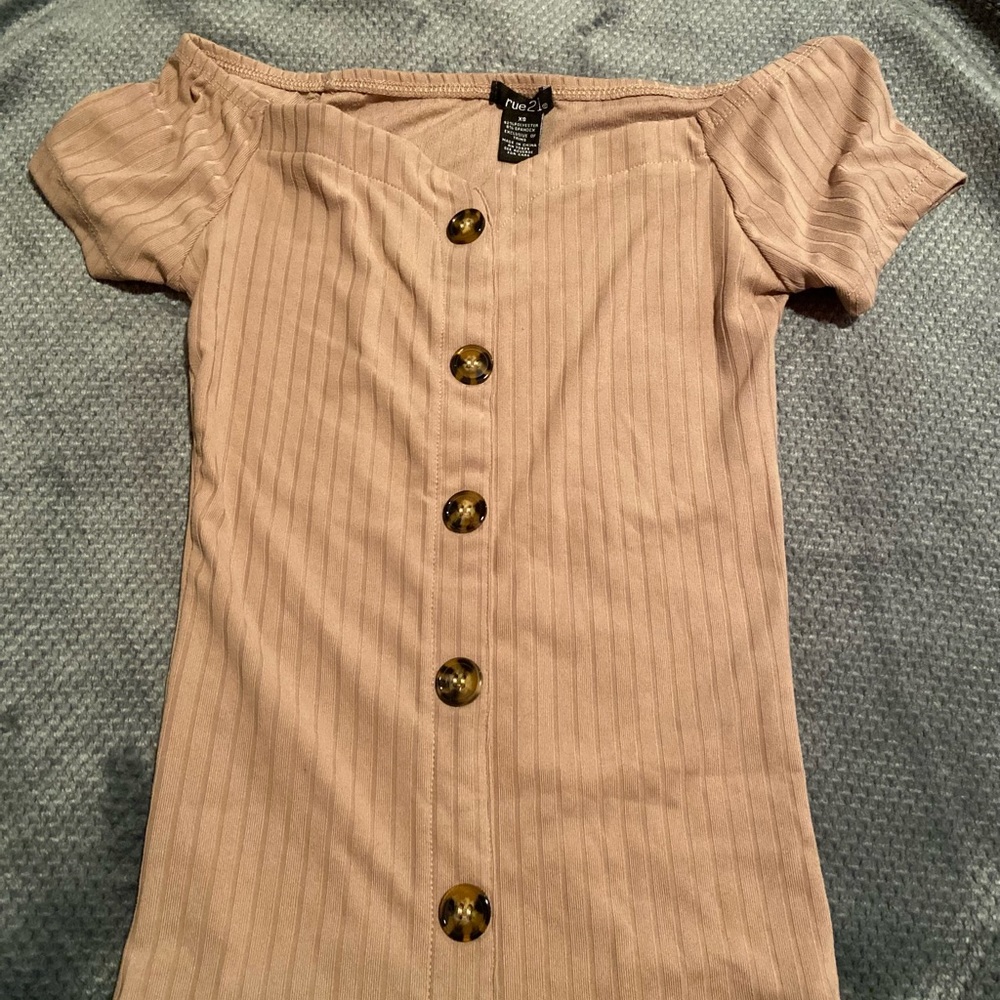 off the shoulder tan shirt